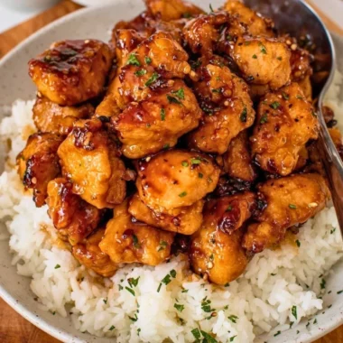 Delicious 20 Minute Honey Garlic Chicken Bites served with garnishes
