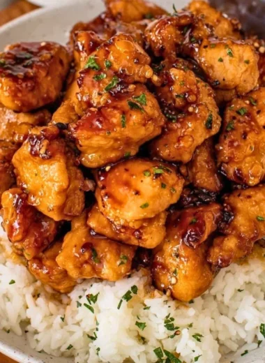 Delicious 20 Minute Honey Garlic Chicken Bites served with garnishes