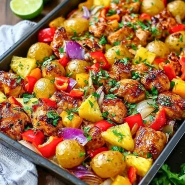 Pineapple Chicken Sheet Pan Dinner with vibrant vegetables and pineapple slices