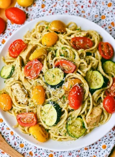 Summer Pasta with Parmesan, Zucchini, Tomato, and Chicken in a bowl