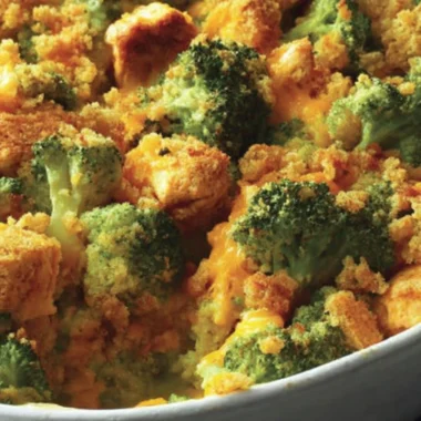 A delicious bowl of contest-winning broccoli chicken casserole topped with cheese.
