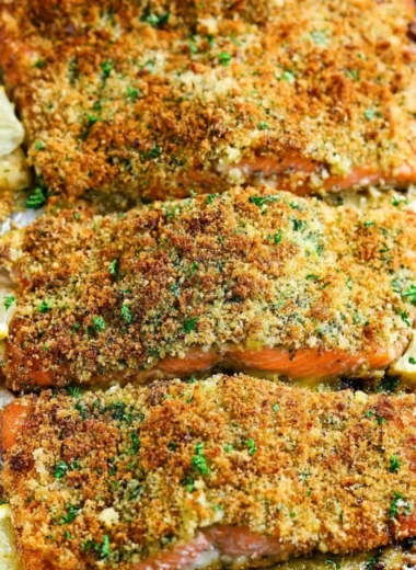 Crispy garlic parmesan salmon served with a side of vegetables