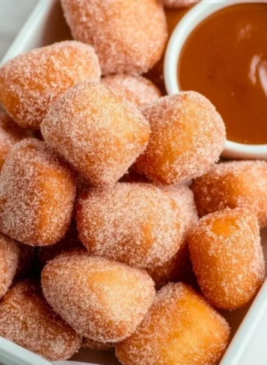 Healthy air fryer churro bites served on a plate with cinnamon sugar