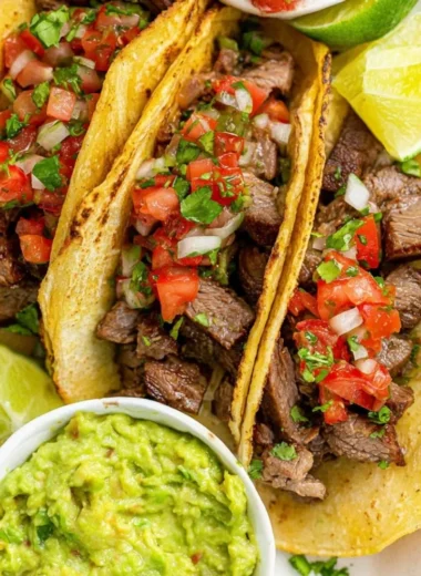 Delicious grilled beef tacos served with fresh toppings