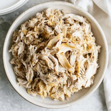 Flavorful shredded chicken suitable for various dishes like tacos and salads
