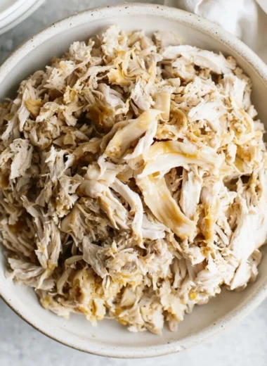 Flavorful shredded chicken suitable for various dishes like tacos and salads