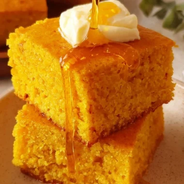 Homemade Sweet Potato Cornbread served on a rustic wooden table