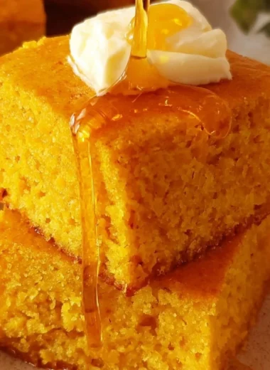 Homemade Sweet Potato Cornbread served on a rustic wooden table