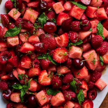 Colorful watermelon fruit salad with mixed fruits in a bowl