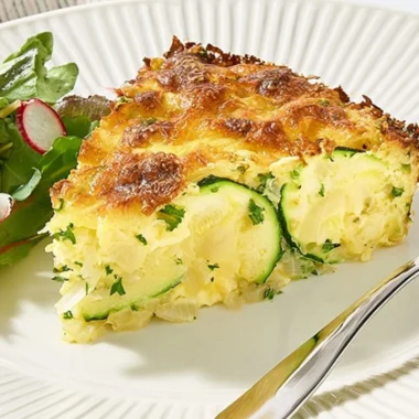 Delicious homemade zucchini pie, baked to perfection and ready to enjoy.