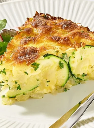 Delicious homemade zucchini pie, baked to perfection and ready to enjoy.