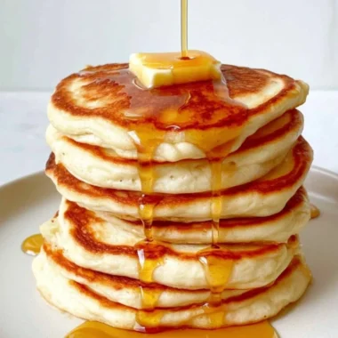 Delicious fluffy Greek Yogurt Pancakes served with fresh fruit