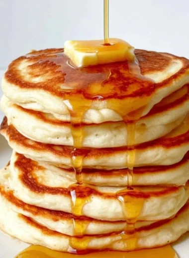 Delicious fluffy Greek Yogurt Pancakes served with fresh fruit