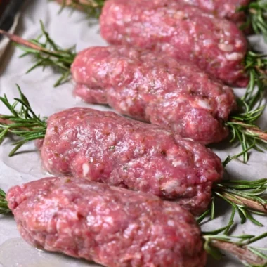 Delicious lamb koftas with rosemary served on a plate.