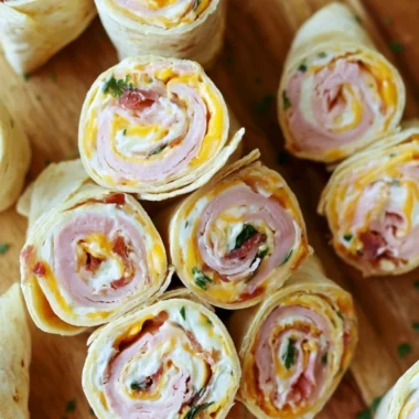 Turkey Bacon Cheese Tortilla Pinwheels rolled with cheese and turkey bacon, perfect for snacks.