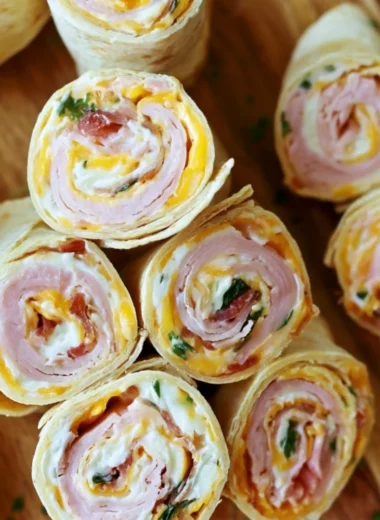 Turkey Bacon Cheese Tortilla Pinwheels rolled with cheese and turkey bacon, perfect for snacks.